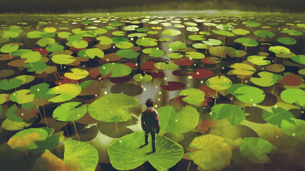 Young Man On Giant Lily Pad Leaf